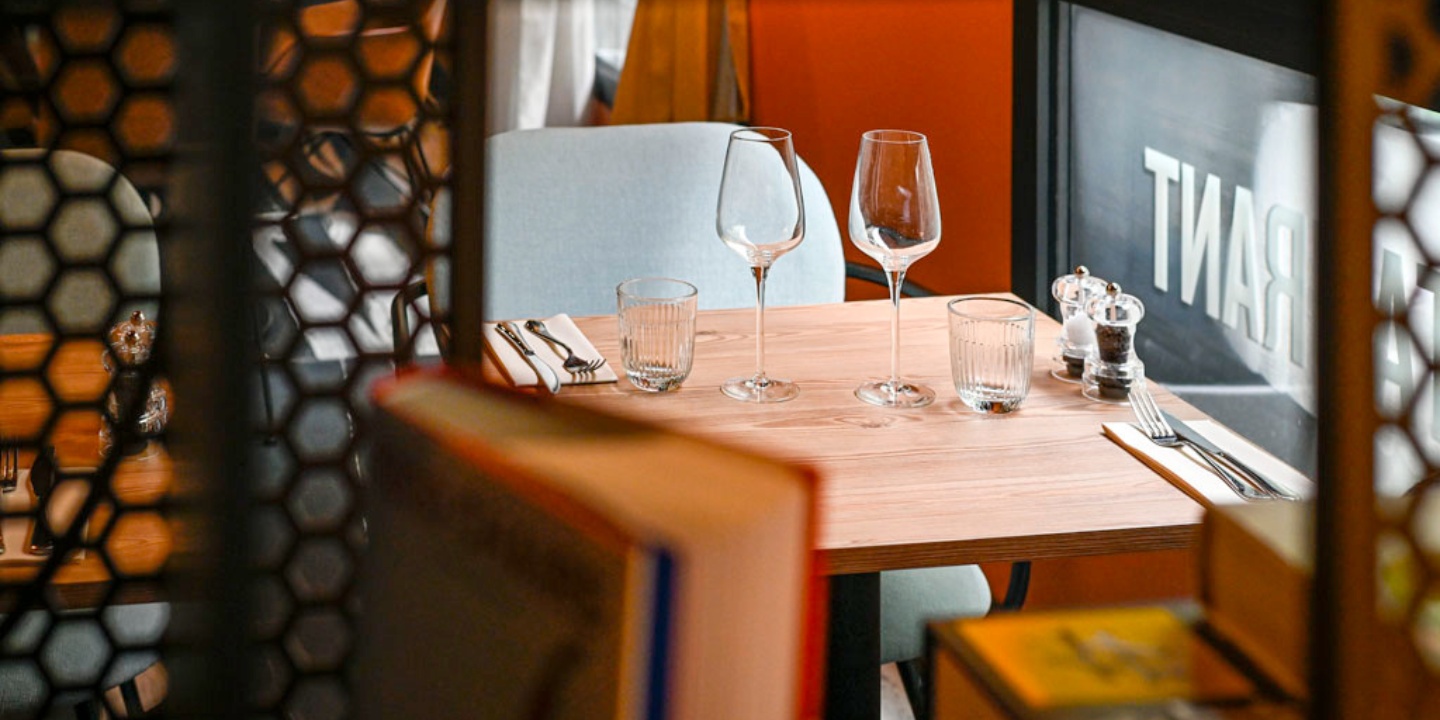 a close-up view of a laid table at the restaurant TRIBE Table
