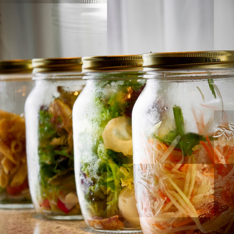 Salads in glass takeaway jars.