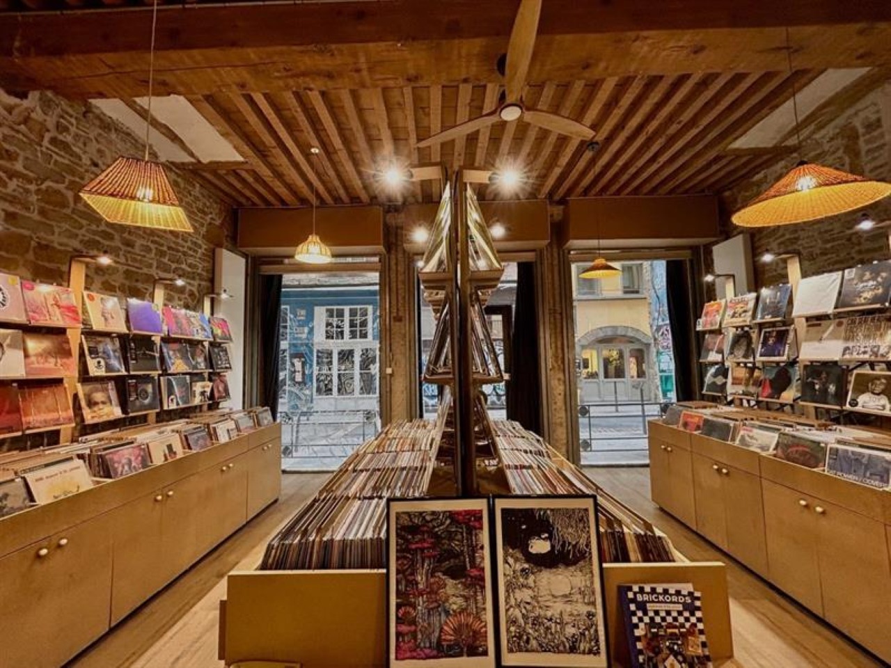 A record shop with racks of vinyl records.