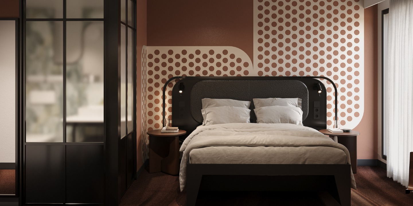 Stylish bedroom with modern decor: a dark wood bed, white linens, round side tables, salmon walls with polka dot patterns, and soft natural light.