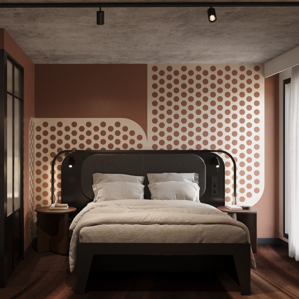 Stylish bedroom with modern decor: a dark wood bed, white linens, round side tables, salmon walls with polka dot patterns, and soft natural light.
