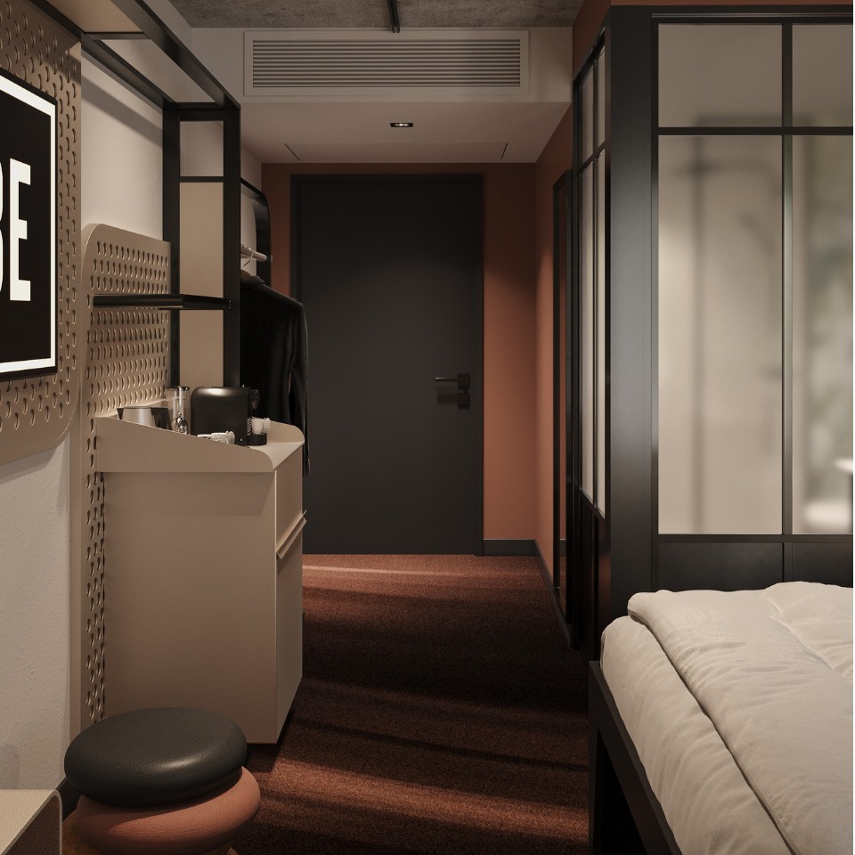 Modern hotel room with minimal decor. Features a bed, black door, warm lighting, and a small coffee station. The atmosphere is cozy and inviting.