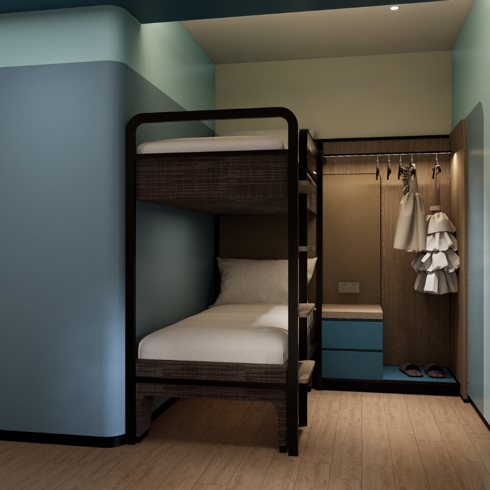 Compact hotel family suite with custom wooden bunk beds, built-in wardrobe, and minimalist blue-accented nightstand.
